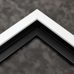 This matte white canvas floater frame features a slim, simple face. Dress it up with an old watercolor or oil painting, or keep it modern with a family photograph. 

.75 "es wide: ideal for small images.